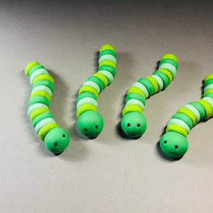 Fondant edible caterpillars perfect for DIY cake/cupcake party decorations