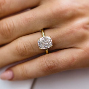 Double claw deals prong solitaire setting