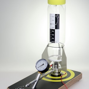 Water Rocket Explorer &quot;Little Bear&quot;, black-yellow circles motif, with two rockets, manufactured in Berlin, Germany