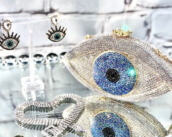 evil eye makeup bolsa
