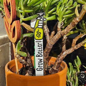 Grow better! Good omens inspired plant pot spike