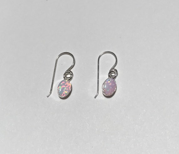 Sterling Silver 5x7mm Oval Created White Opal Post Earrings Sterling Silver 5x7mm Oval Created White Opal Post Earrings