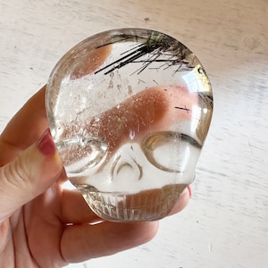 Tourmaline Rutile Palm Crystal Skull with Rainbows Carved by Leandro de Souza