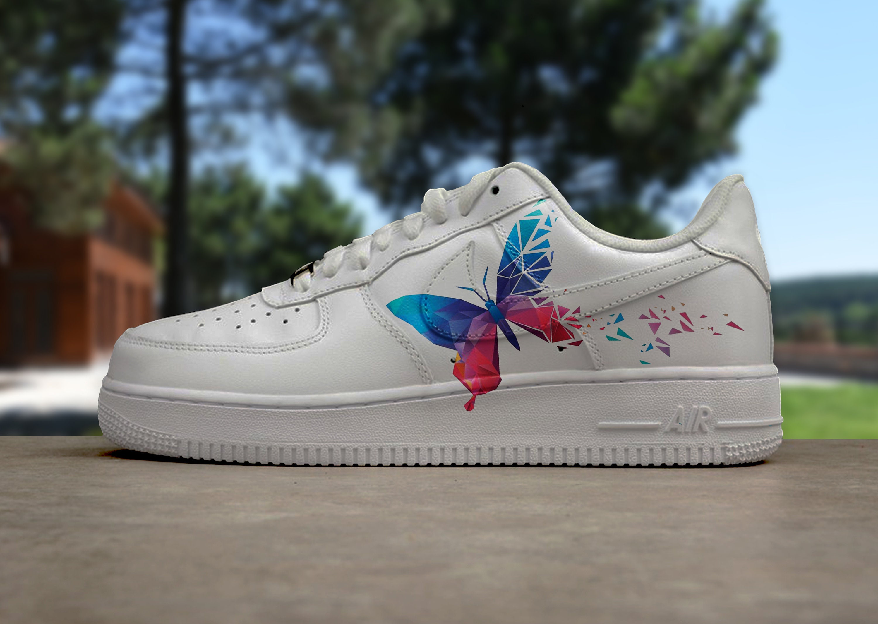 white air forces with blue butterflies