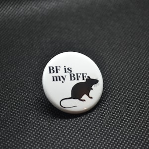 May include: White button with black text and a silhouette of a rat. The text reads "BF is my BFF".