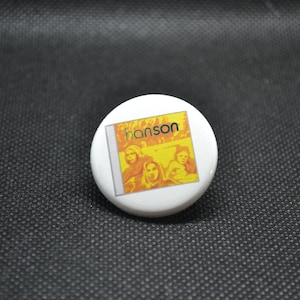 hanson album button, mmmbop hanson cd, hanson cd button, millennial buttons, hanson backpack button, hanson fans, hanson brothers