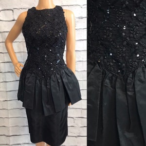 Vintage Black Open Back Peplum Cocktailkleid
