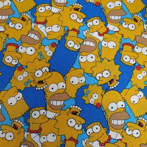 May include: Fabric featuring a repeating pattern of yellow cartoon characters on a blue background. The characters include a man, a woman, and a girl, each with distinct facial features and hairstyles. The fabric is likely intended for crafting or apparel.