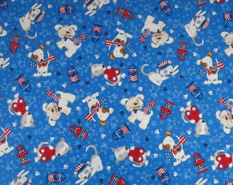 Tela "Patriotic Pooch" de Studio E, diseño de Victoria Hutto: perros, cachorros e hidrantes dispersos sobre un fondo azul estrellado.