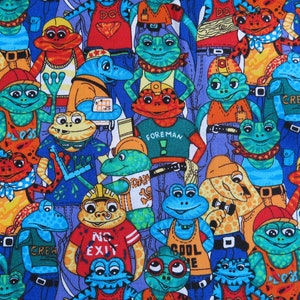May include: A colorful fabric with a repeating pattern of frogs wearing different outfits and hats. The frogs are wearing clothes with various phrases, including "Crew", "Foreman", "No Exit", and "Cool Dude".