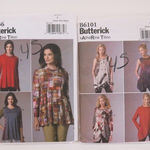 May include: Two Butterick sewing pattern envelopes, B6136 and B6101, showing images of women's tops. The B6136 pattern features a red long-sleeved top and a patterned top. The B6101 pattern displays a sleeveless top and a long-sleeved top.