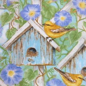 May include: A fabric pattern featuring a repeating design of yellow birds perched on light blue birdhouses with white trim. The background includes blue morning glory flowers and green leaves, creating a nature-inspired theme.