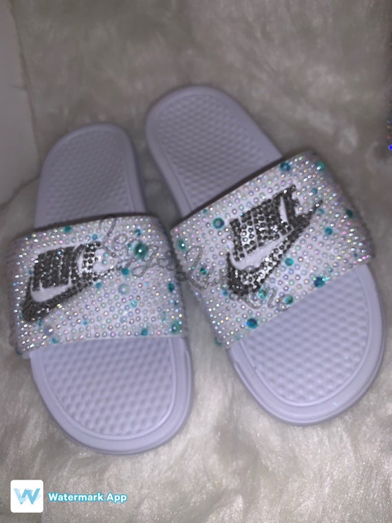 teal and white nike slides