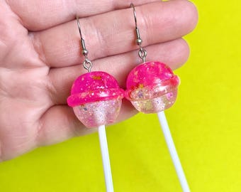 Glitter roze lolly oorbellen kitsch kitscherige oorbellen kawaii oorbellen snoep oorbellen grappige oorbellen funky oorbellen leuke oorbellen funky