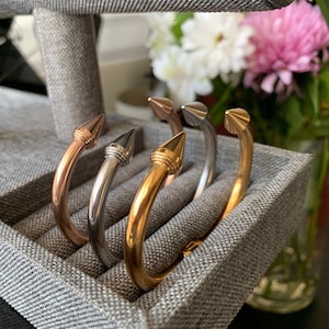 Nail head bracelet top