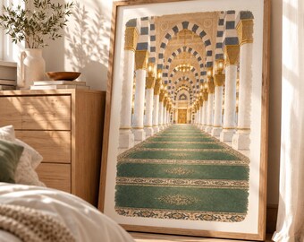 May include: A framed wall art print depicting a long, symmetrical corridor inside a mosque. The scene features rows of white columns with blue and gold accents, a green carpeted floor with intricate patterns, and warm, glowing hanging lanterns.