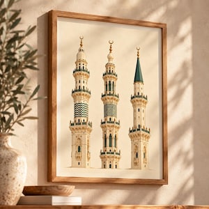 May include: A framed wall art print featuring three tall, ornate minarets in cream, white, and teal green. Each minaret is topped with a golden crescent moon finial. The architectural structures display intricate detailing, balconies, and geometric patterns.
