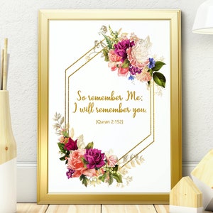 May include: A gold framed print with a white background and a floral design. The print features a quote from the Quran: "So remember Me: I will remember you. [Quran 2:152]"