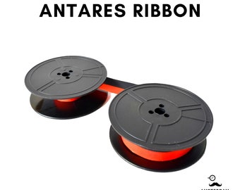 May include: Black typewriter ribbon spools with an orange ribbon. The ribbon is labeled "Antares Ribbon".