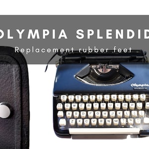 Pode incluir: Uma máquina de escrever Olympia Splendid azul escuro com teclas brancas. A imagem inclui um close-up da caixa da máquina de escrever e o texto "OLYMPIA SPLENDID Replacement rubber feet".