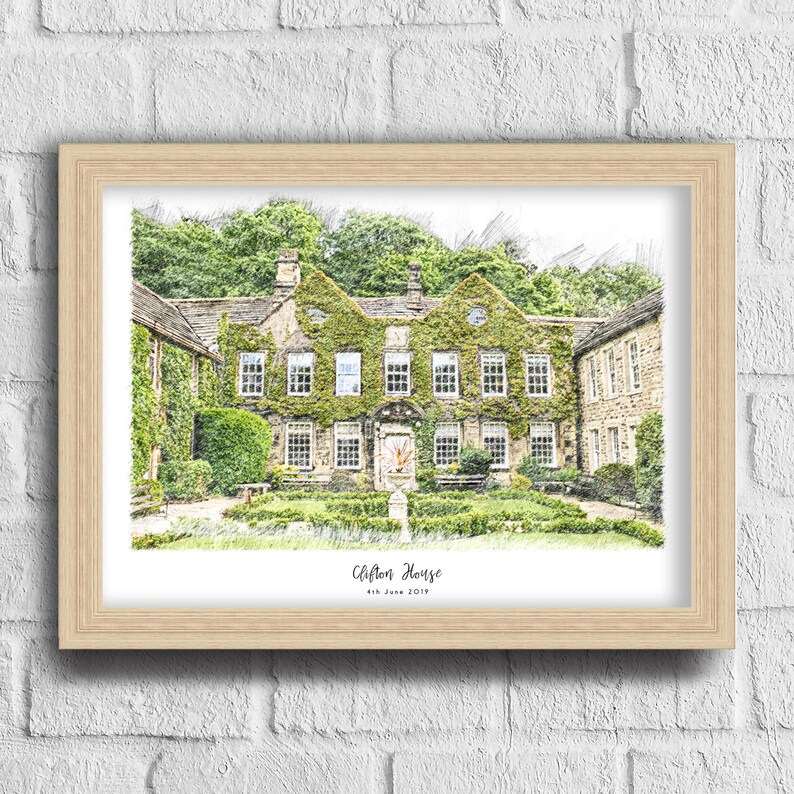 May include: A framed print of Clifton House, a large stone building covered in ivy. The image has a sketched effect, with the text "Clifton House" and "4th June 2019" at the bottom. The frame is light-colored wood.