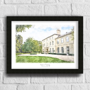 May include: A framed print featuring a pencil sketch of a large, light-colored building with multiple windows, set against a backdrop of green trees and a blue sky. The print is in a black frame, with the names "Tara & Tommy" and the date "23rd July 2021" at the bottom.