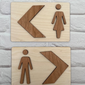 Toilet / restroom signposts made in multi-layered two tone wood, direction guides
