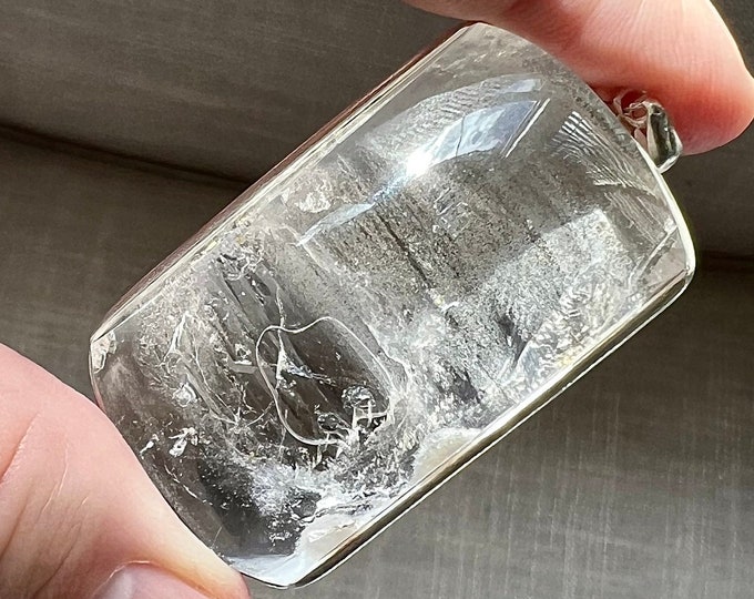 Fine large bubble Enhydro - quartz rock crystal specimen pendant with chain