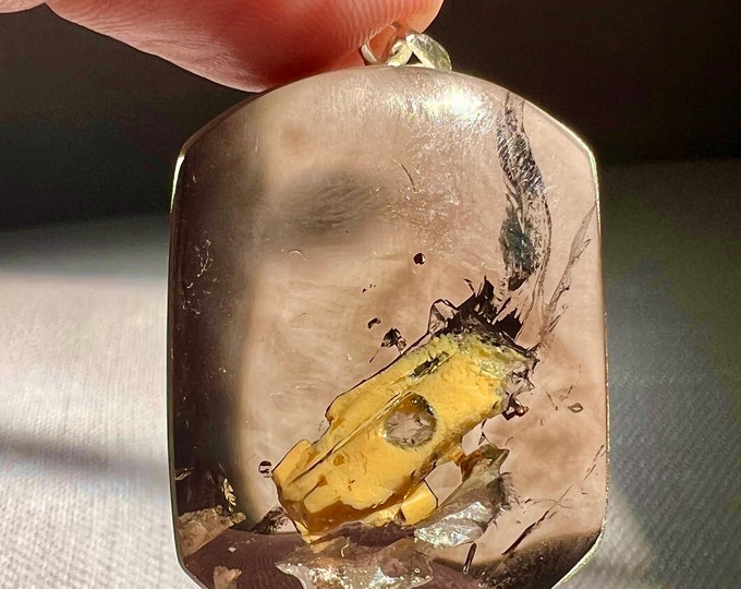 Specialty Enhydro - Quartz rock crystal with moving bubble in a cavity packed with thick yellow mineral- silver pendant ID A0361