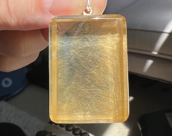Inclusion - faceted quartz rock crystal silver pendant with superb golden rutile inclusions - IDA 0354