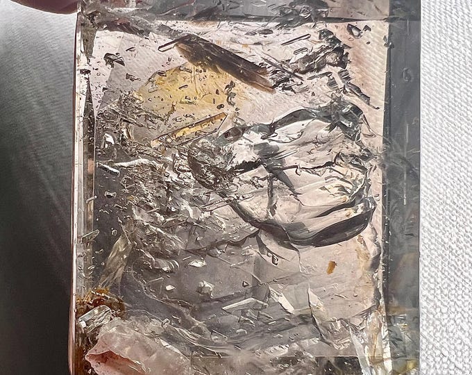 Enhydro - Large heavy block of Quartz rock crystal with enhydro and top internal formations - ID A0592