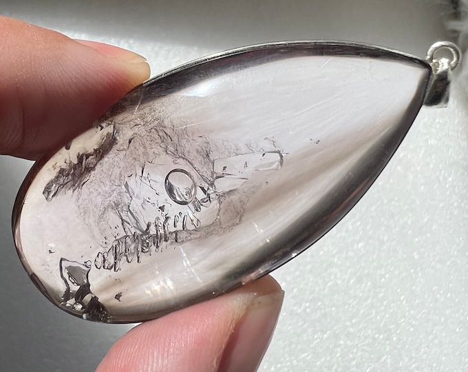 Fascinating Enhydro: 1 bubble turning into 2 bubbles and back to 1! Moving bubble quartz rock crystal specimen with chain