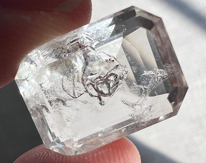 Faceted Enhydro - quartz rock crystal bubble inclusion - ID A0144