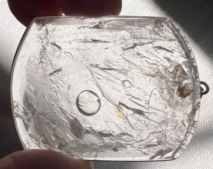 Rare extra THIN pendant with large bubble moving in a large cavity - lots of movement - quartz rock crystal specimen ID A0335