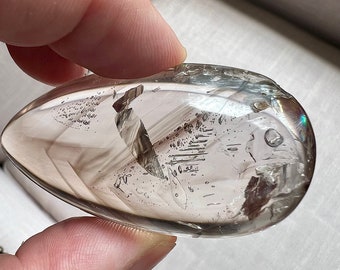 Unmounted Enhydro crystal with bubble, smokey phantoms and internal crystal formations - ID A0831