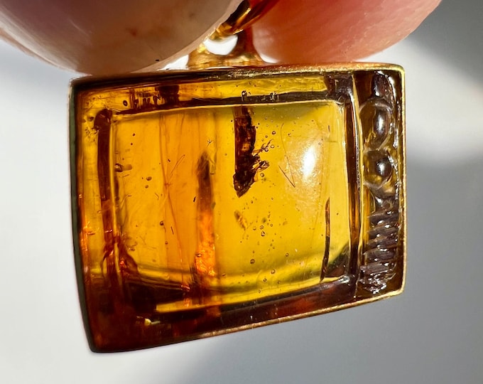 Amber - detailed amber carving of an old TV with a fossilized moth - plated silver pendant IDA0689