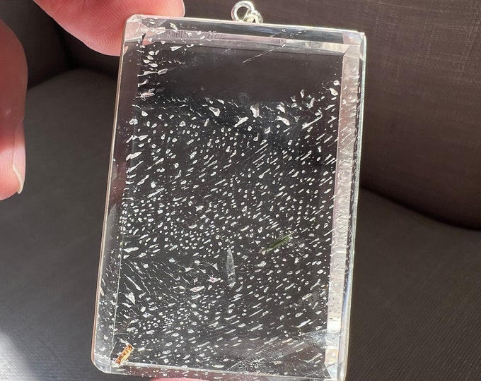Inclusion - Uncommon - High quality quartz crystal pendant with "galaxy" of tiny internal formations and epidote crystal - ID A0339