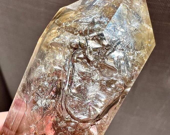 Enhydro polished rock crystal specimen with 4 moving bubbles and golden healer - ID A0606