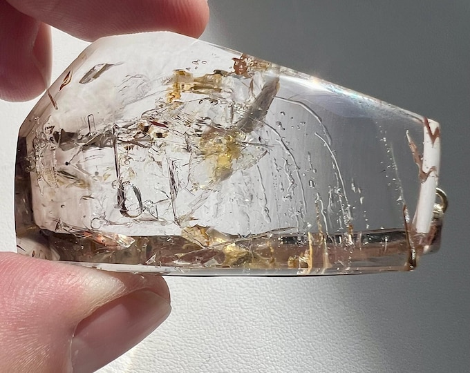 Enhydro quartz rock crystal pendant with multiple bubbles: some moving, some fixed - beautiful inclusions - ID A0690