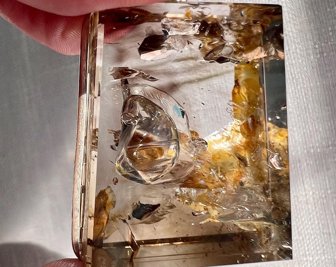 Enhydro pendant with large moving bubble and smoky phantoms, golden healer - quartz rock crystal - ID A0662