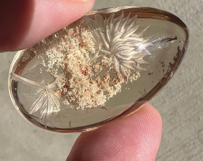 Superb high quality Quartz Rock crystal with an intaglio style carving with play of inclusion - lotus flowers - display, pendant ID A0043