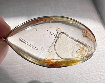 Enhydro pendant with large moving bubble - quartz rock crystal with golden healer inclusion - ID A0505