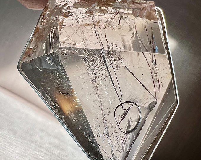 Elegant faceted Enhydro pendant with large bubble with lots of movement - quartz rock crystal inclusions - ID A0536