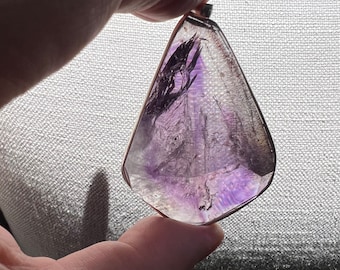 Amethyst Enhydro pendant with large bubble - clear Brazil amethyst phantom with enhydro inclusion
