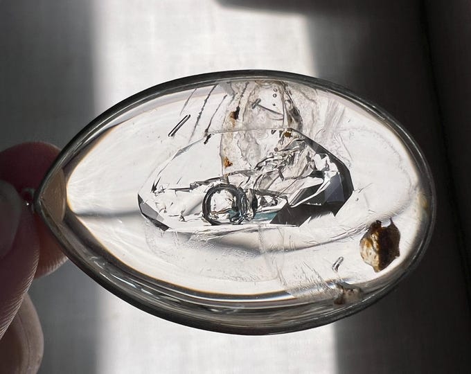 Elegant teardrop pendant with moving bubble in a rare crystal shaped cavity  - quartz rock crystal ID A0532