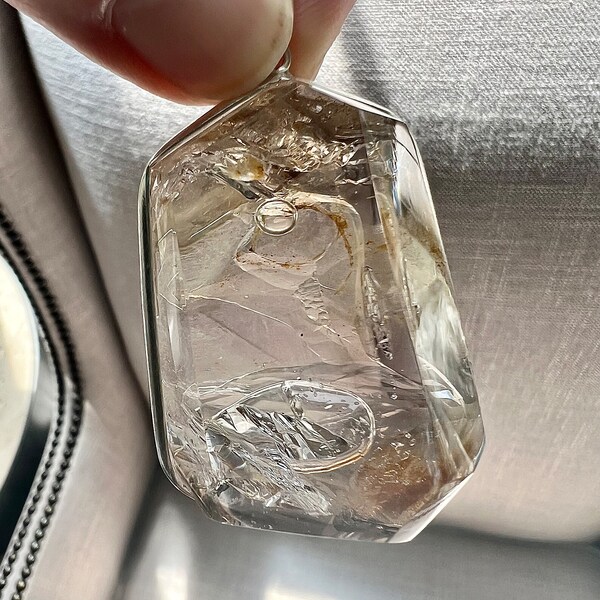 Massive large moving bubble enhydro pendant - quartz rock crystal with 2 moving bubbles and internal crystal formations