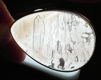 Enhydro - large polished quartz crystal pendant with XL enhydro bubble and superb internal crystal formations - ID A0324