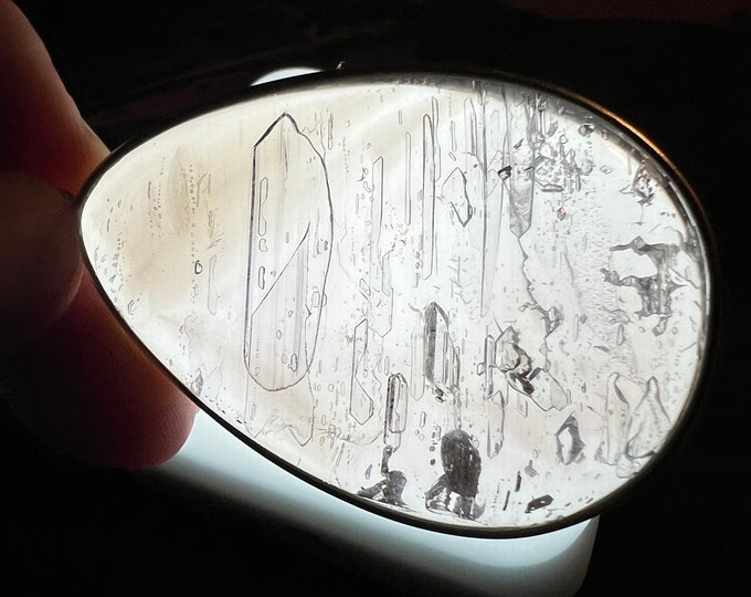 Enhydro - large polished quartz crystal pendant with XL enhydro bubble and superb internal crystal formations - ID A0324