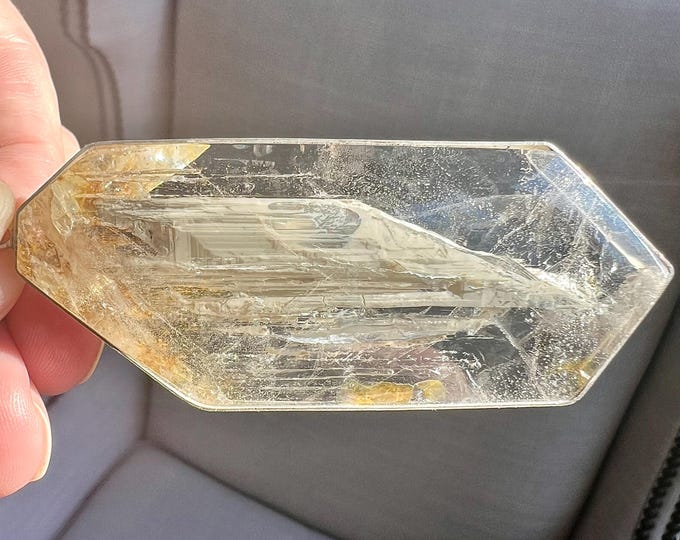 Fascinating quartz rock crystal enhydro pendant - large moving bubble moving through grey sand - multi bubbles - ID A0455