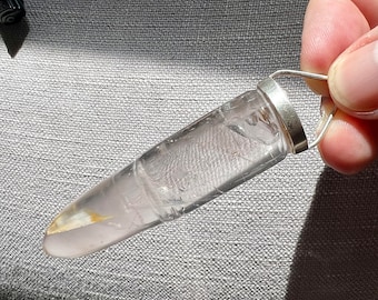 Enhydro pendant - Bullet shaped quartz rock crystal carving with moving enhydro bubble inclusion -